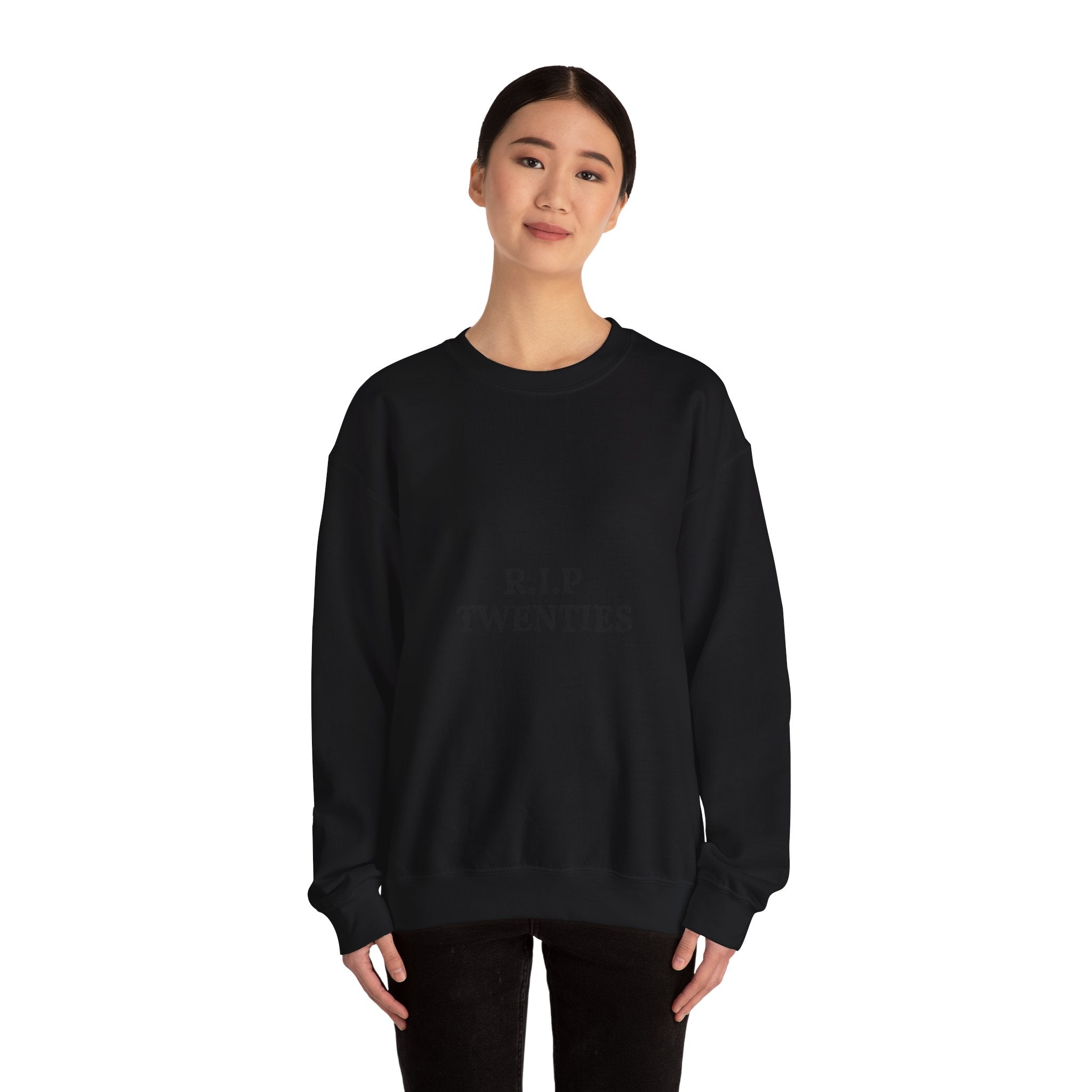 Person wearing a navy blue sweatshirt on a white background